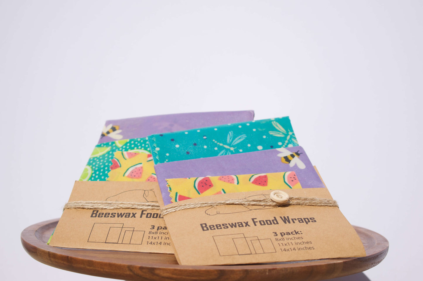 3 pack Beeswax Food Wraps featuring vibrant patterns, ideal for eco-friendly food storage by GreenLife Apothecary.