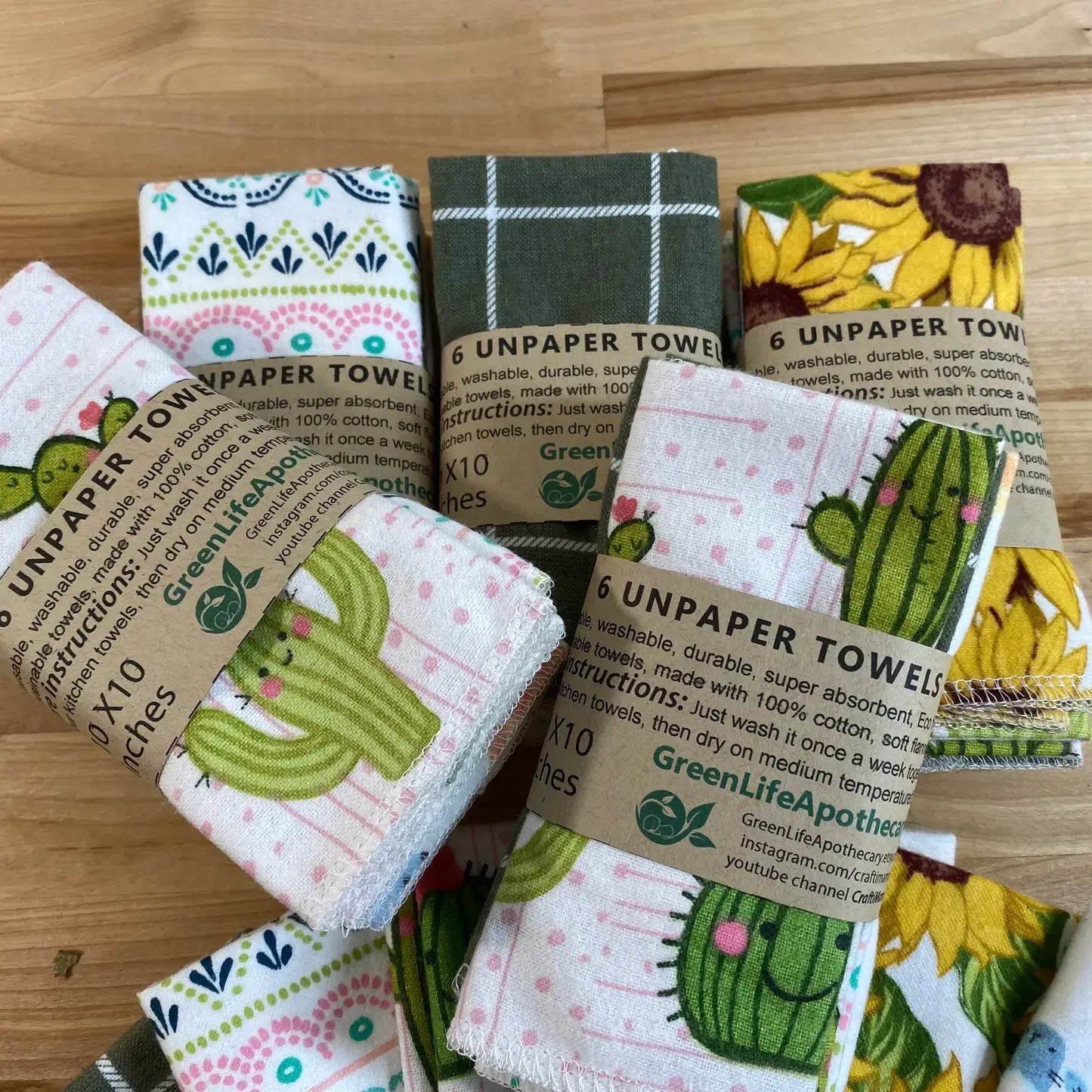 12 pack of GreenLife Apothecary unpaper towels in various designs, 10x10 inches, reusable and eco-friendly.